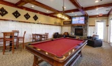 Pool table at the luxury apartments for lease: Woodlands of Charlottesville