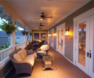 Clubhouse balcony lounge at Woodlands of Charlottesville luxury rental apartments