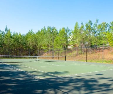 Tennis court at Woodlands of Charlottesville luxury apartment rentals